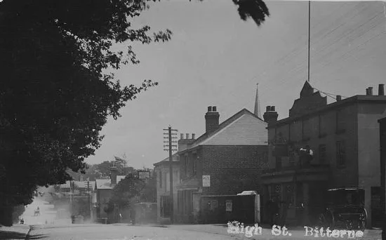 Carpenters Arms seen centre beyond telegraph post